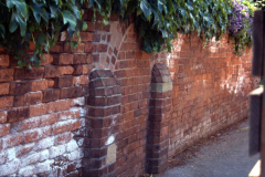 Aspley_Hall_-_Eskdale_Drive_blocked_up_access_in_old_wall_to_vegetable_garden_1997_colour