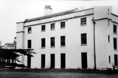 Aspley_Hall_-_south_side_showing_sitting_and_dining_rooms_plus_conservatory_c_1955