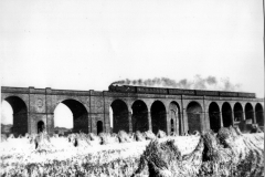 Awsworth_-_Viaduct_-_Locomotive__five_carriages_almost_across_the_viaduct_-_1950s