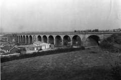Awsworth_-_Viaduct_-_with_small_bungalows_and_large_industrial_shed