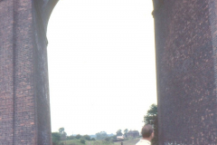 Awsworth_-_Viaduct_built_1871_arch_with_view_through_and_male_figure_in_foreground_1960s