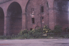 Awsworth_-_Viaduct_built_1871_the_workmans_cottages_built_into_the_archway_1960s