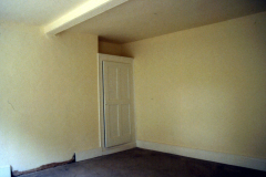 Basford_-_Basford_Hall_-_Interior_servants_room_on_top_floor_stripped_even_fireplace_gone_1998_colour