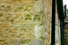 Beauvale_Priory_-_Ornamental_window_fragment_reused_in_wall_of_Beauvale_Cottage_colour_1996