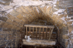 Beauvale_Priory_-_Priors_House_blocked_up_vaulted_passage_colour_1996