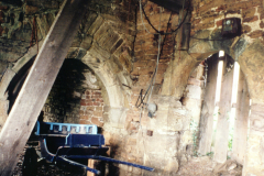 Beauvale_Priory_-_Priors_House_doorway_boarded_up__remains_of_holy-water_stoup_July_1996._Colour