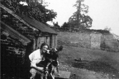 Broxtowe_-_Broxtowe_Hall_-_duck_sheds_in_yard_of_farm_c_1930_with_Cousin_Mabel