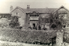 Broxtowe_-_Broxtowe_Hall_-_front_of_house_and_arch_c_1920