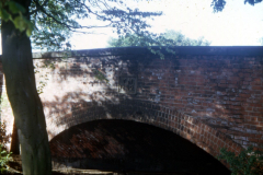 Cinderhill_-_plaque_on_railway_bridge_reading_T.N.1852_Bagnall_Road_1973.__Colour._Distant_shot